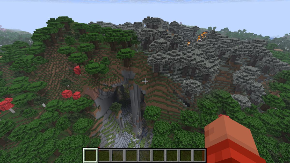 Minecraft a pale garden on fire above a large cave