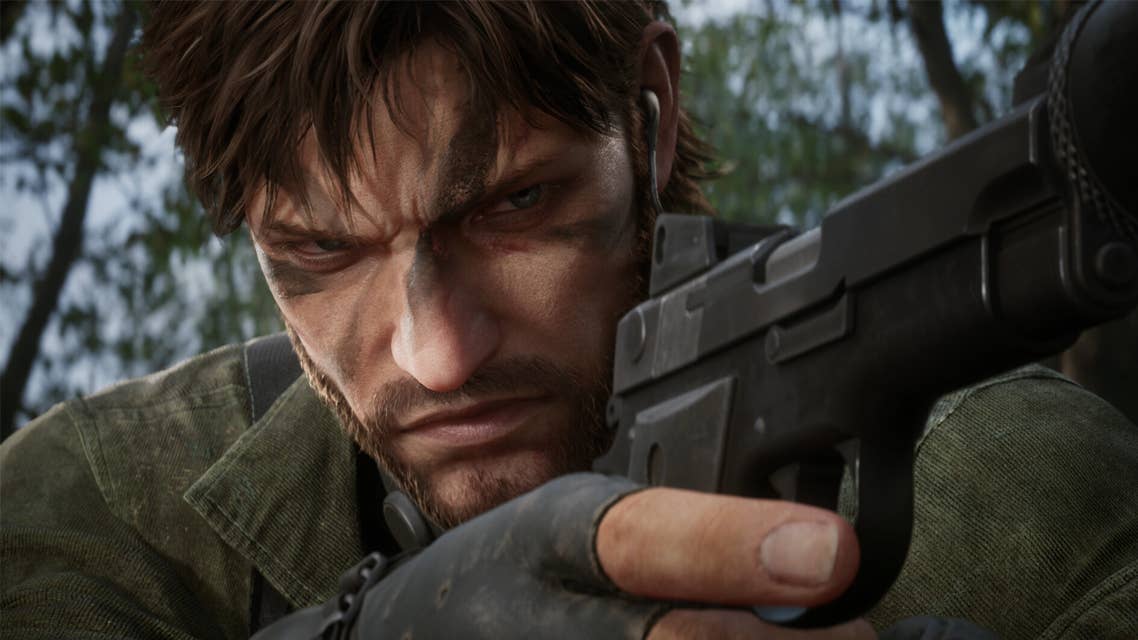 Naked Snake holding a gun and wearing camo in the jungle in Metal Gear Solid Delta: Snake Eater.