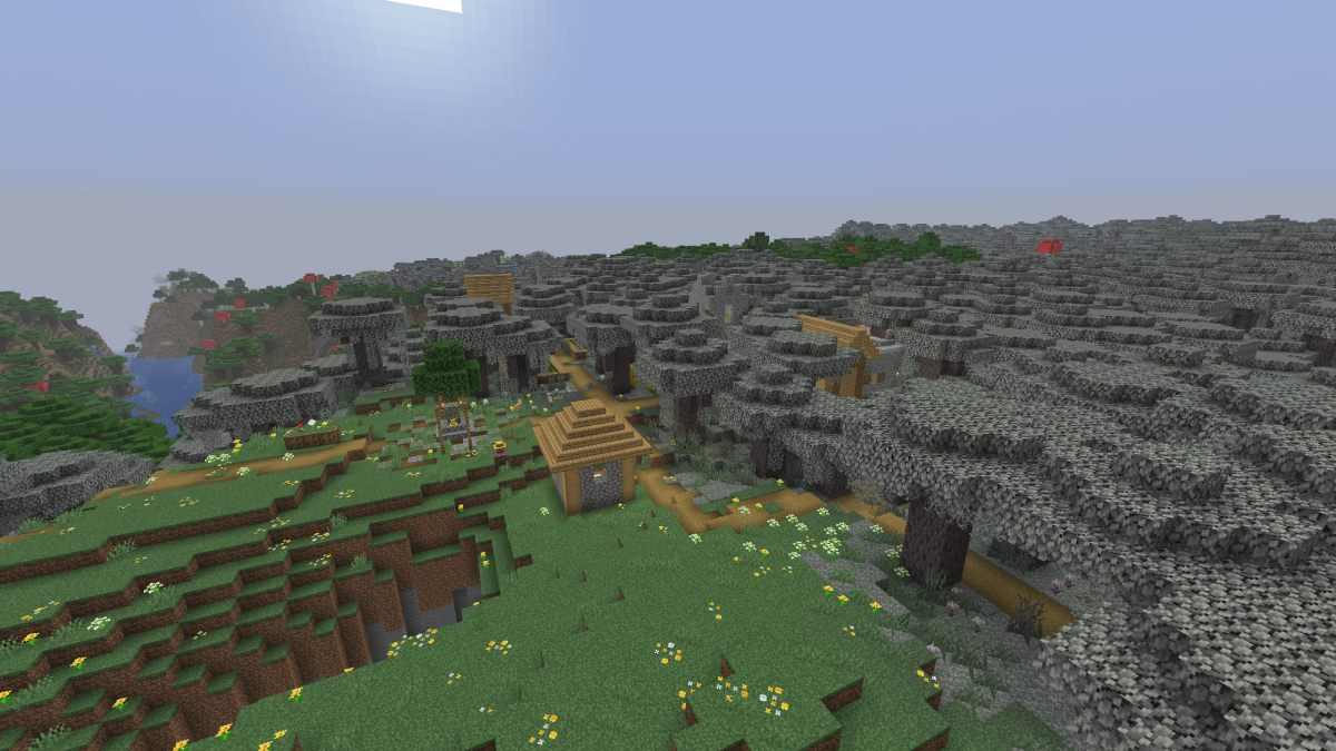 Minecraft a village inside a pale garden on a hill
