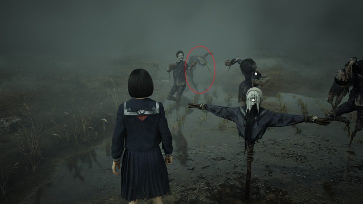A girl in a dark blue school uniform stands in a misty field surrounded by humanoid scarecrows.