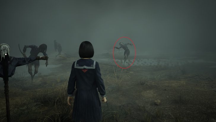 A character in a sailor uniform stands in a foggy field surrounded by unsettling figures; red circle highlights one in the distance.