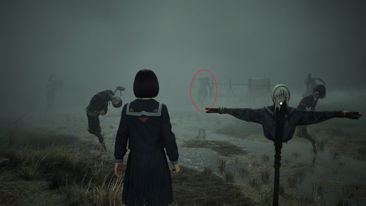 A character in a blue uniform observes a desolate foggy landscape with scarecrows and zombie-like figures.